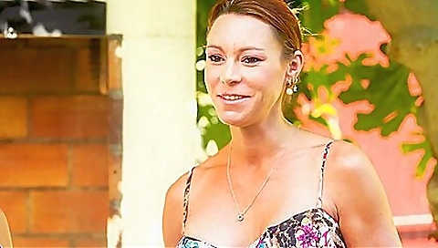 Redhead babe takes a long shot of herself in a hot photo