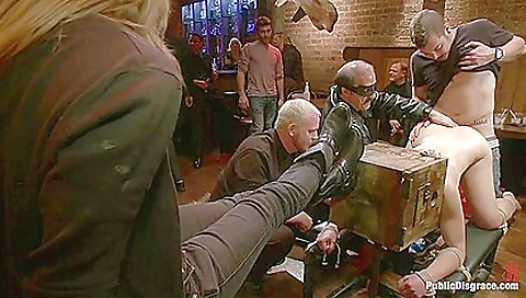 Busty redhead and brunette in a tattooed threesome