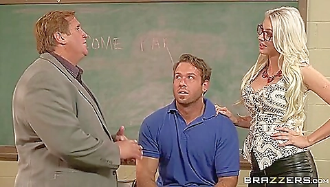 Busty milf in stockings gets on desk and fucks with her teacher