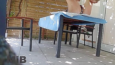 Arab girl shows her body and high heels on the outdoors