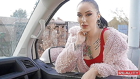 Porn movie featuring a brunette with a tattooed pussy