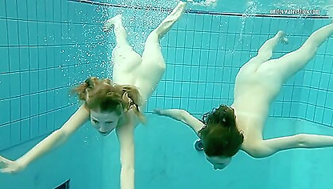 Nastya Undresses Libuse In The Pool Like A Lesbian