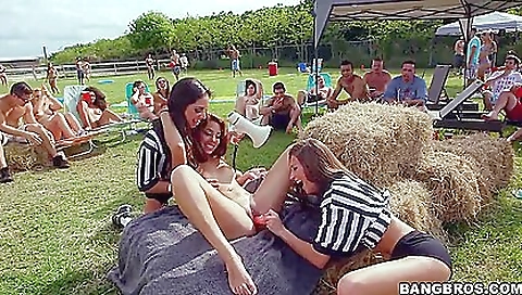 Lesbian girlfriends are having fun in the public place