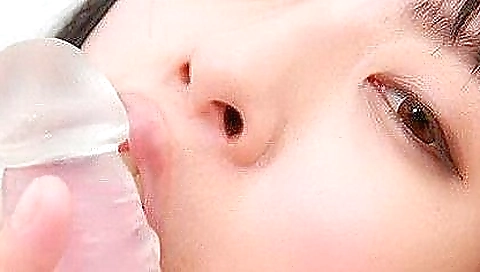 Asian girl is naked and poses in a solo porn video