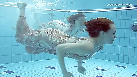 Two Dressed Beauties Underwater Netrebko And Poleshuk